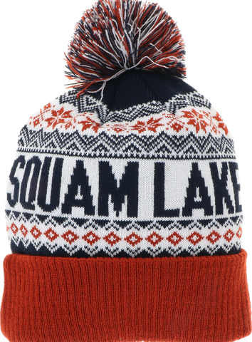 Nordic snowflake and triangle design with Squam Lake knit in the center. Navy and rust color with Pom on top 