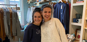 Customers in the store with new Squam Lake Sweatshirts