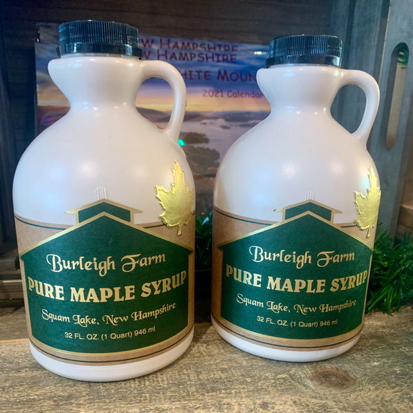 Close up of plastic 32oz jug of Burleigh Farms Maple Syrup